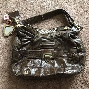 Juicy couture brown leather shoulder bag.